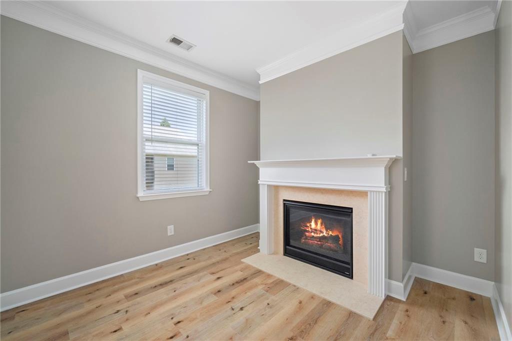 3628 Ashcroft Bend Atlanta, GA 30319 - Photo 26 of 44 a room with a fireplace and a fireplace