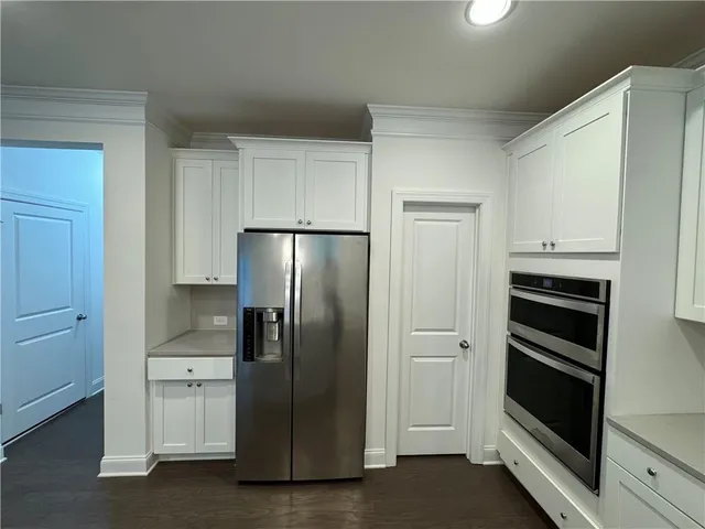 a bathroom with a shower and toilet