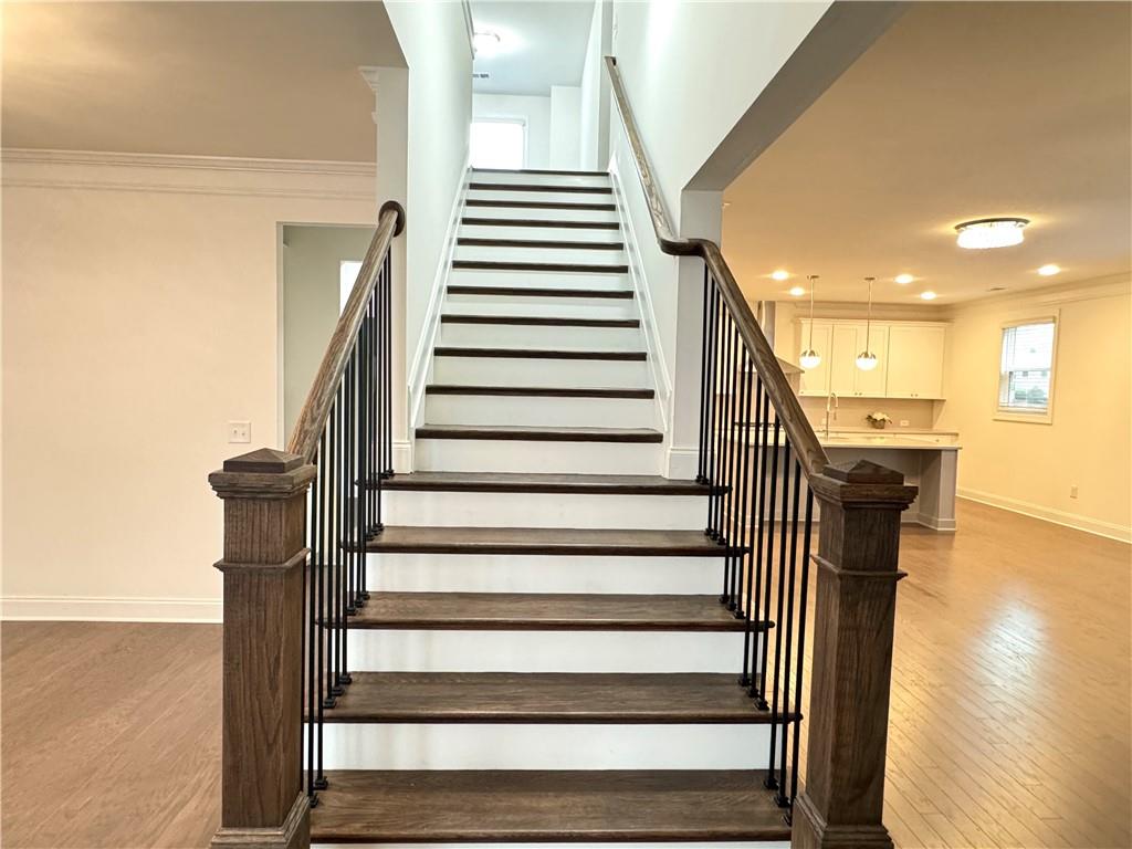 210 Hamlet Drive Duluth, GA 30097 - Photo 16 of 39 a view of entryway and hall with wooden floor