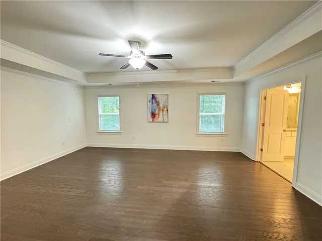 a bathroom with a shower and a sink