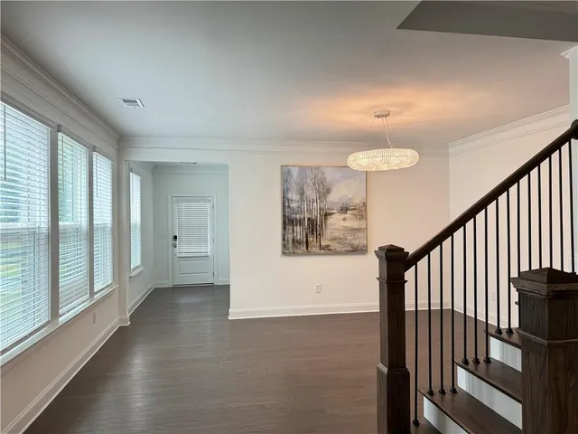 a view of a hallway with an entryway