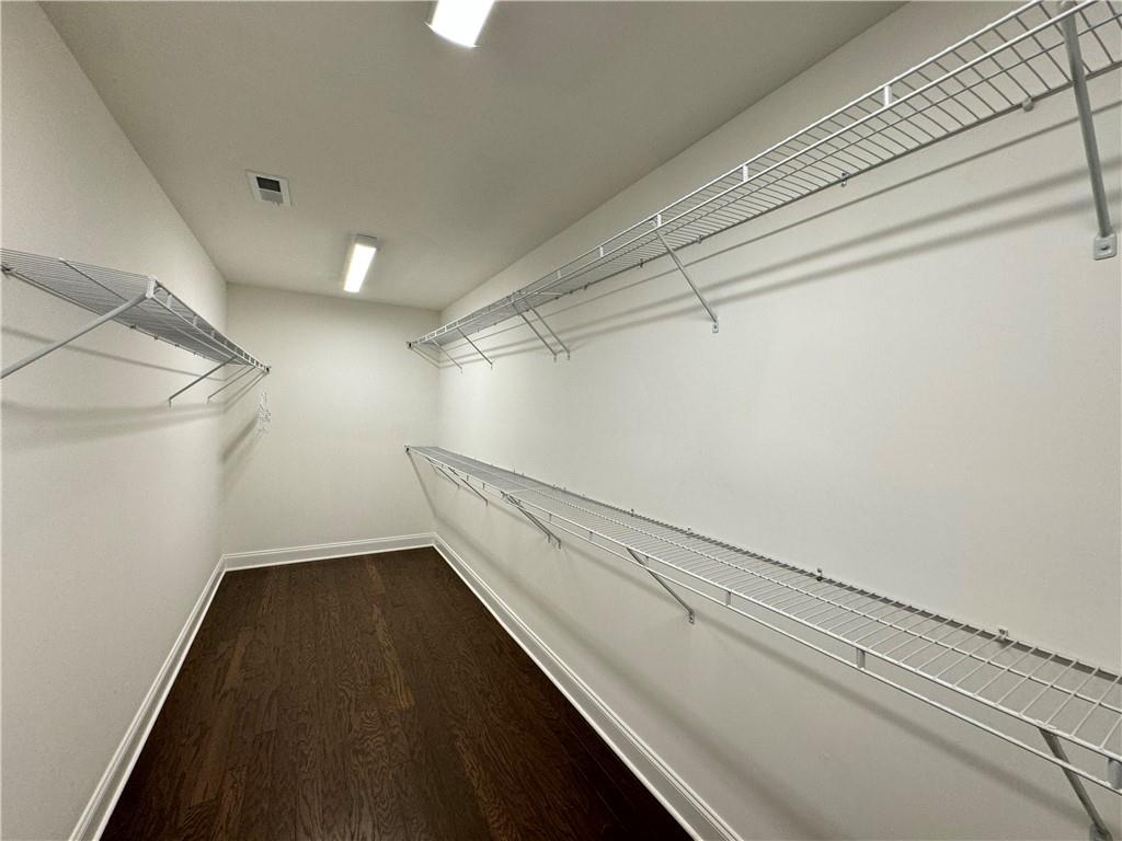 210 Hamlet Drive Duluth, GA 30097 - Photo 24 of 39 a view of a room with racks on the wall