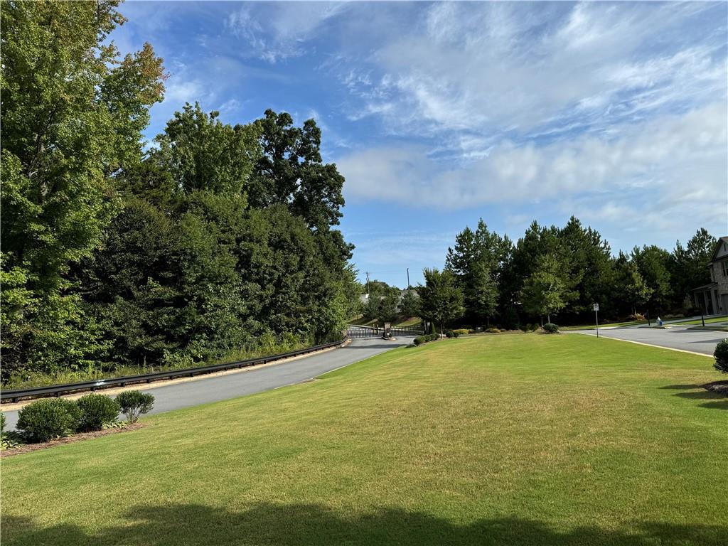 210 Hamlet Drive Duluth, GA 30097 - Photo 35 of 39 a view of an outdoor space and swimming pool