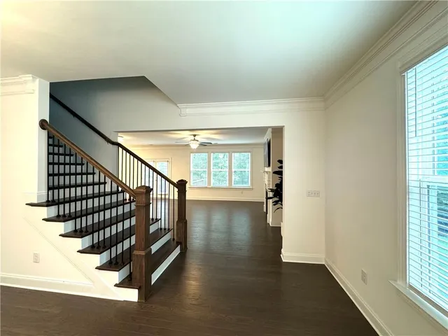 a view of entryway with wooden floor