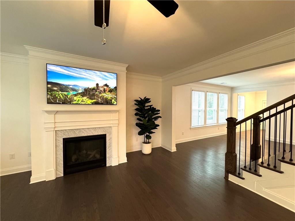 210 Hamlet Drive Duluth, GA 30097 - Photo 7 of 39 a view of an empty room with wooden floor and a window