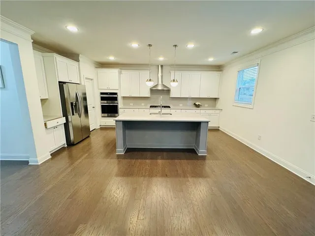 a view of balcony with wooden floor