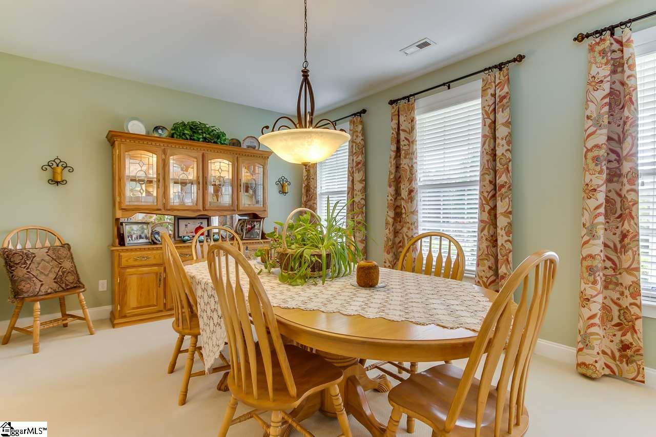 111 Trammell Road Travelers Rest, SC 29690 - Photo 11 of 36 This is a formal dining area which will allow you to extend the table to accommodate huge crowds. We have had extended tables with up to 25 people seated together.