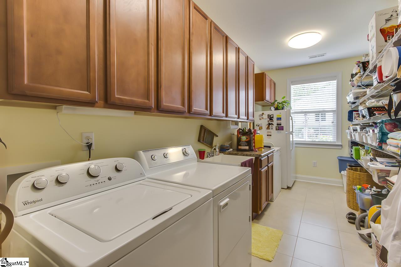 111 Trammell Road Travelers Rest, SC 29690 - Photo 20 of 36 You will love the laundry room. There is an abundance of cabinet storage and shelving. You can never have too much storage.