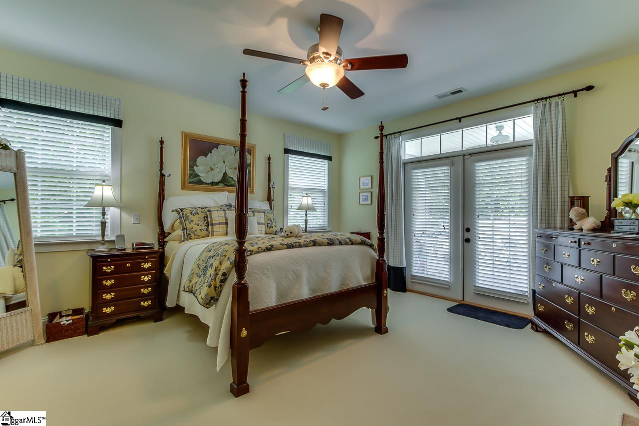 111 Trammell Road Travelers Rest, SC 29690 - Photo 21 of 36 You will enjoy the retreat to the master suite. This is a very spacious master with french doors leading out to the covered porch and pool in the back of the home. There is also the see through fireplace in the master.