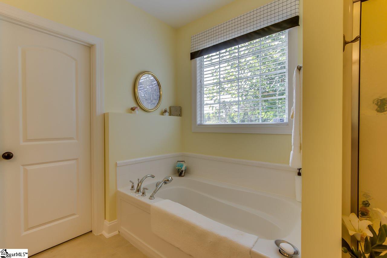 111 Trammell Road Travelers Rest, SC 29690 - Photo 23 of 36 This is a wonderful master bath with a large soaking tub and separate shower. There is a large two sink vanity with granite counter tops and lots of storage.