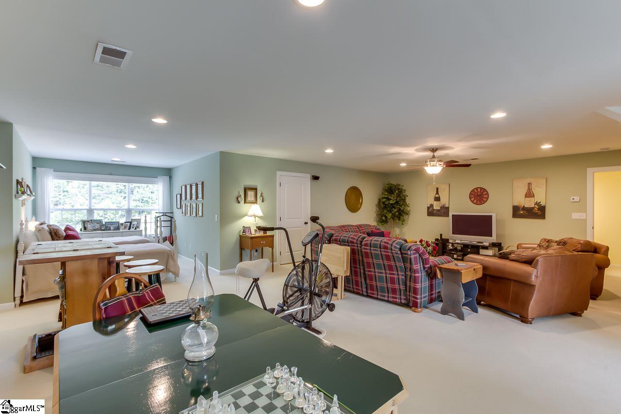 111 Trammell Road Travelers Rest, SC 29690 - Photo 29 of 36 This is another view of the upper great room. There are really 3 separate areas, the sleeping area, the workout area and the entertaining area.