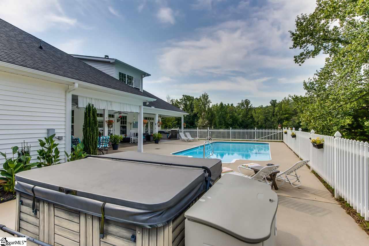 111 Trammell Road Travelers Rest, SC 29690 - Photo 7 of 36 There is also a hot tub in the back of the home next to the pool This is great for early fall and spring swimming if you get a little cold in the pool you can warm up in the hot tub, or enjoy it on it's own during those chilly winter months.