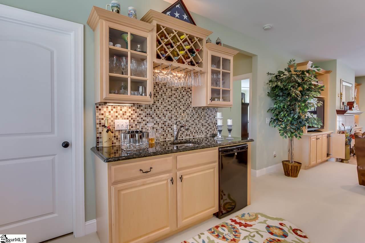 111 Trammell Road Travelers Rest, SC 29690 - Photo 10 of 36 You will enjoy entertaining with your own bar. The bar is beautiful granite and has a sink, glass and wine storage and fridge