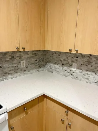 a view of a room with an empty space