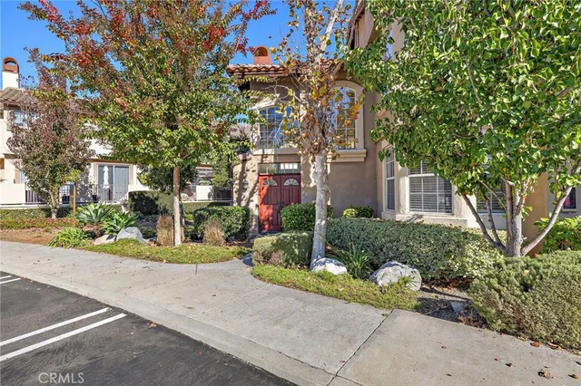 front view of a house with a street