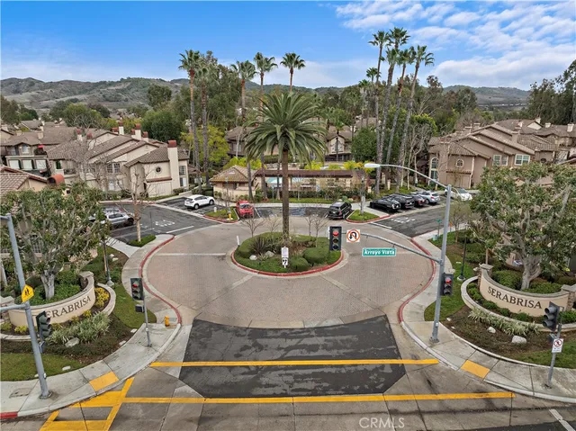 a view of a swimming pool with outdoor seating