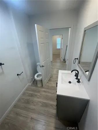 a bathroom with a sink and mirror