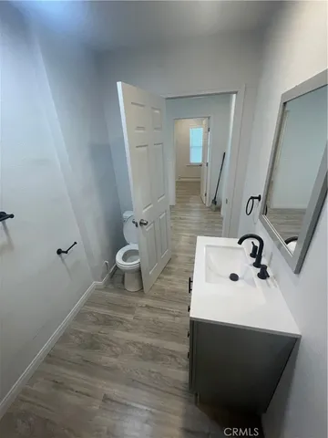 a bathroom with a sink and mirror