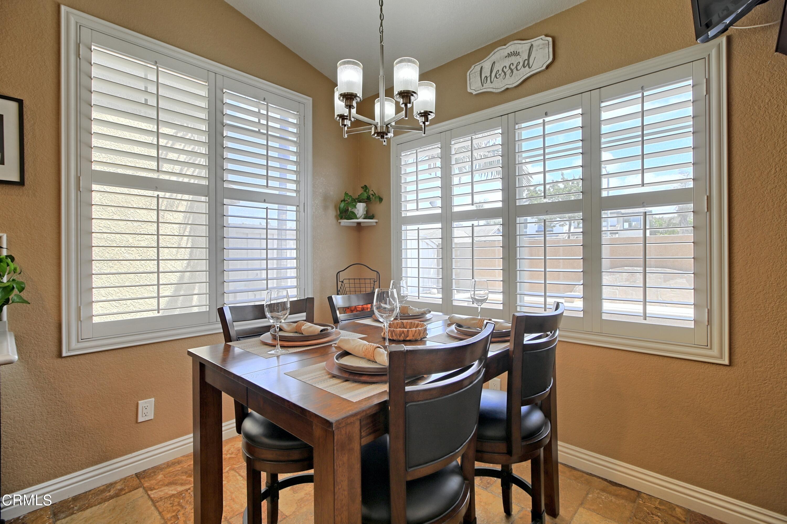 2062 Avila Place Oxnard, CA 93036 - Photo 16 of 52 a view of a dining room with furniture and window