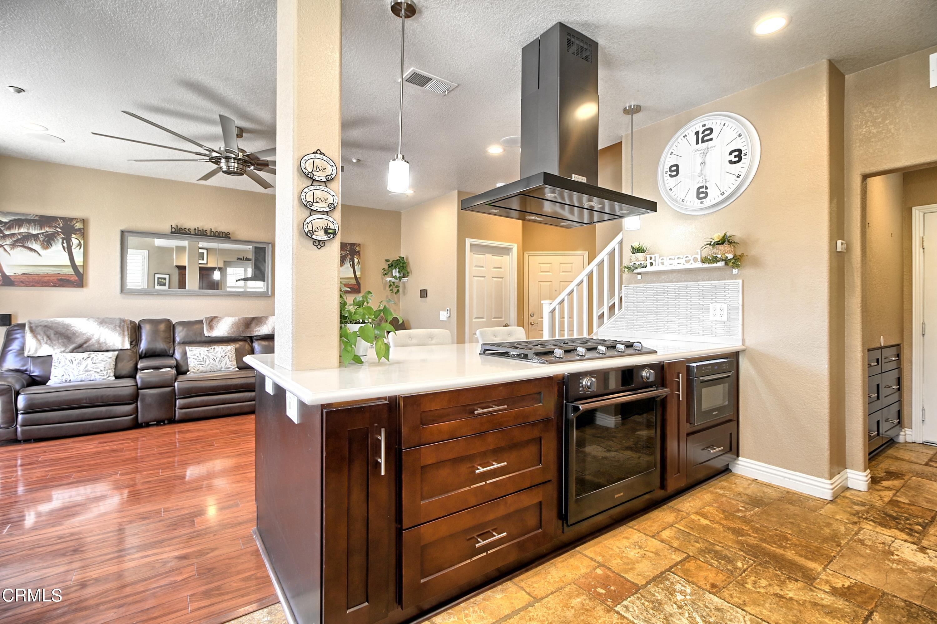 2062 Avila Place Oxnard, CA 93036 - Photo 52 of 52 a spacious bathroom with a granite countertop sink a large mirror and shower