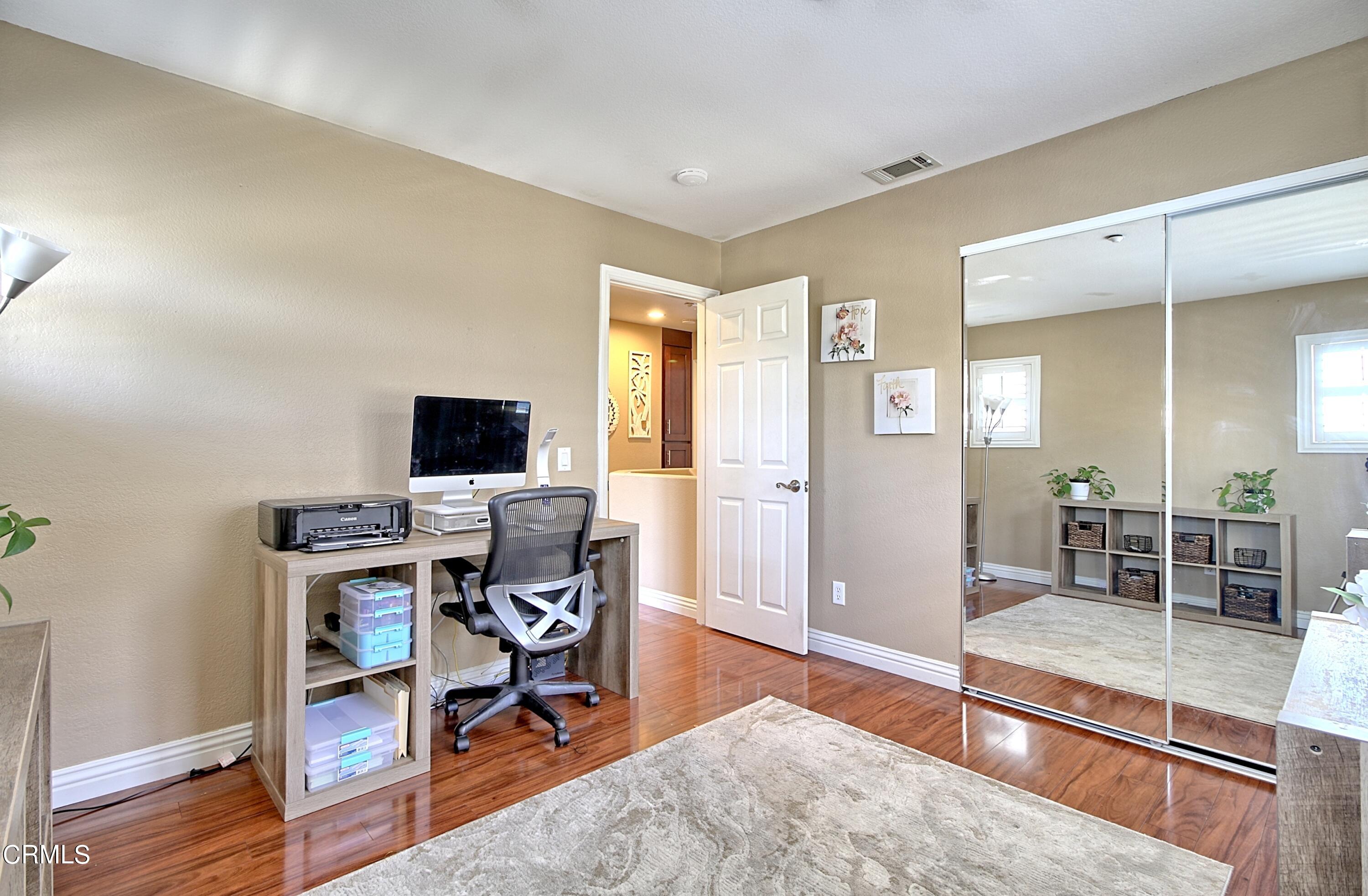 2062 Avila Place Oxnard, CA 93036 - Photo 22 of 52 a view of a livingroom with workspace and a window