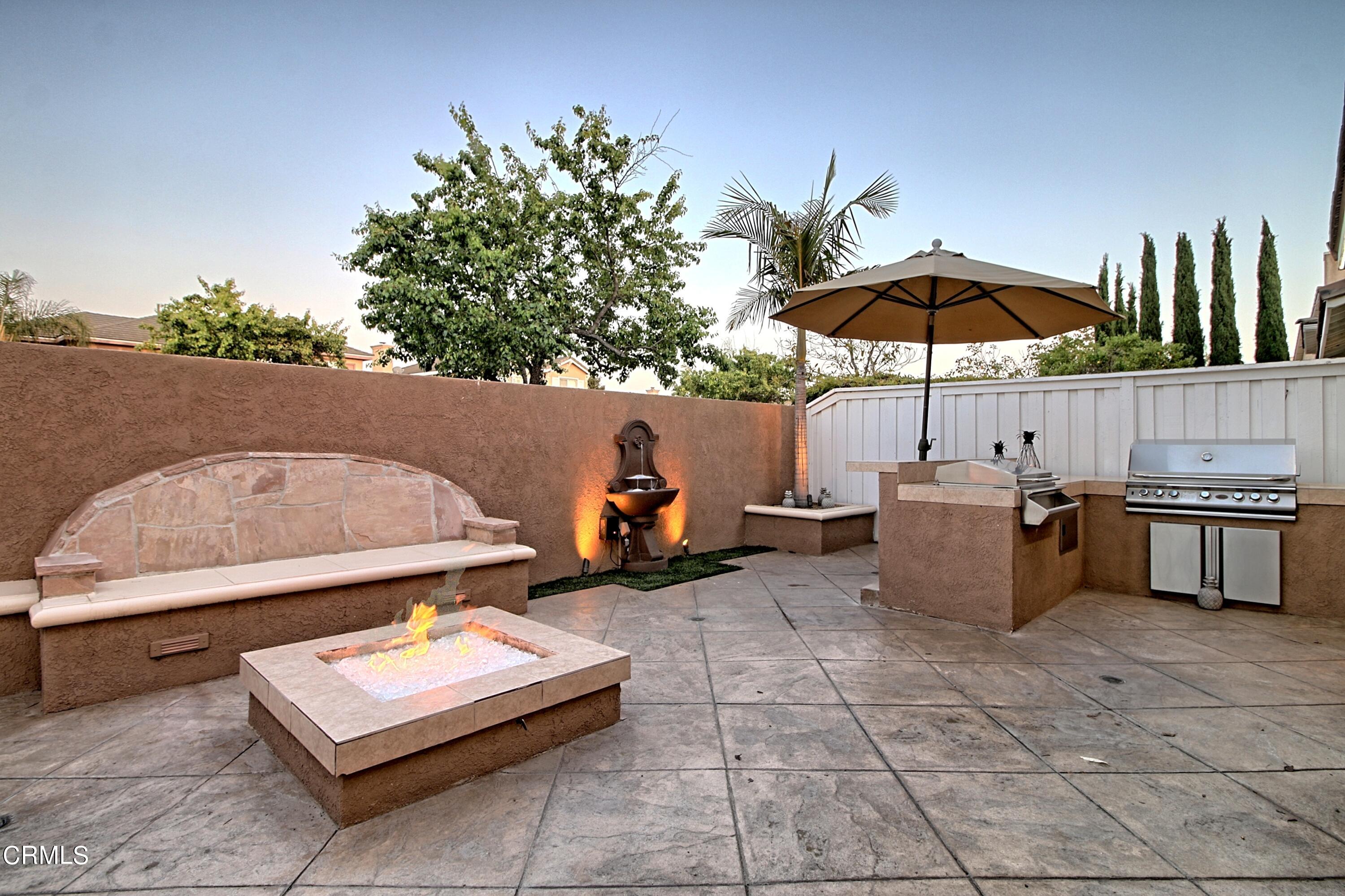 2062 Avila Place Oxnard, CA 93036 - Photo 34 of 52 a view of a patio with chairs and a table