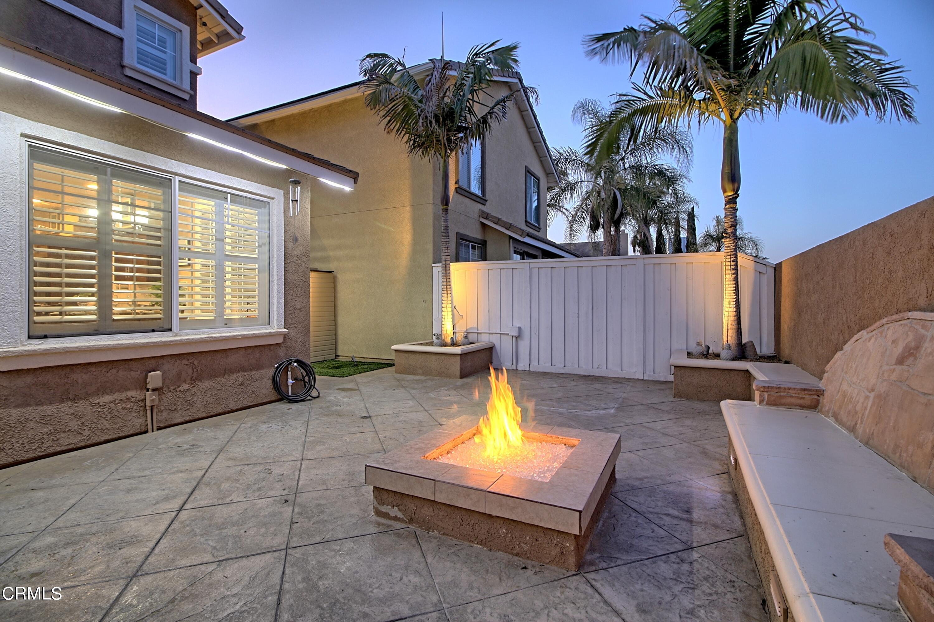 2062 Avila Place Oxnard, CA 93036 - Photo 43 of 52 a view of a house with swimming pool and sitting area