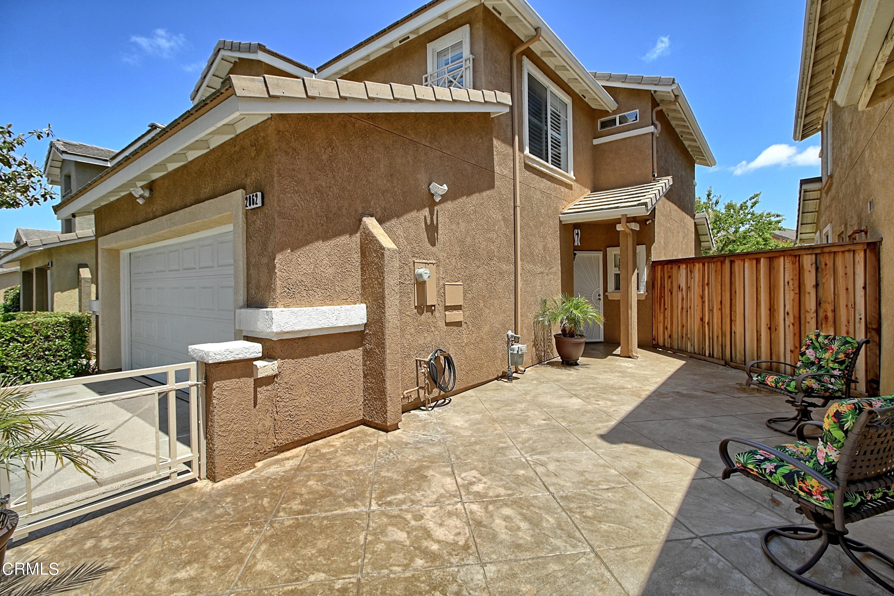 2062 Avila Place Oxnard, CA 93036 - Photo 46 of 52 a backyard of a house with table and chairs