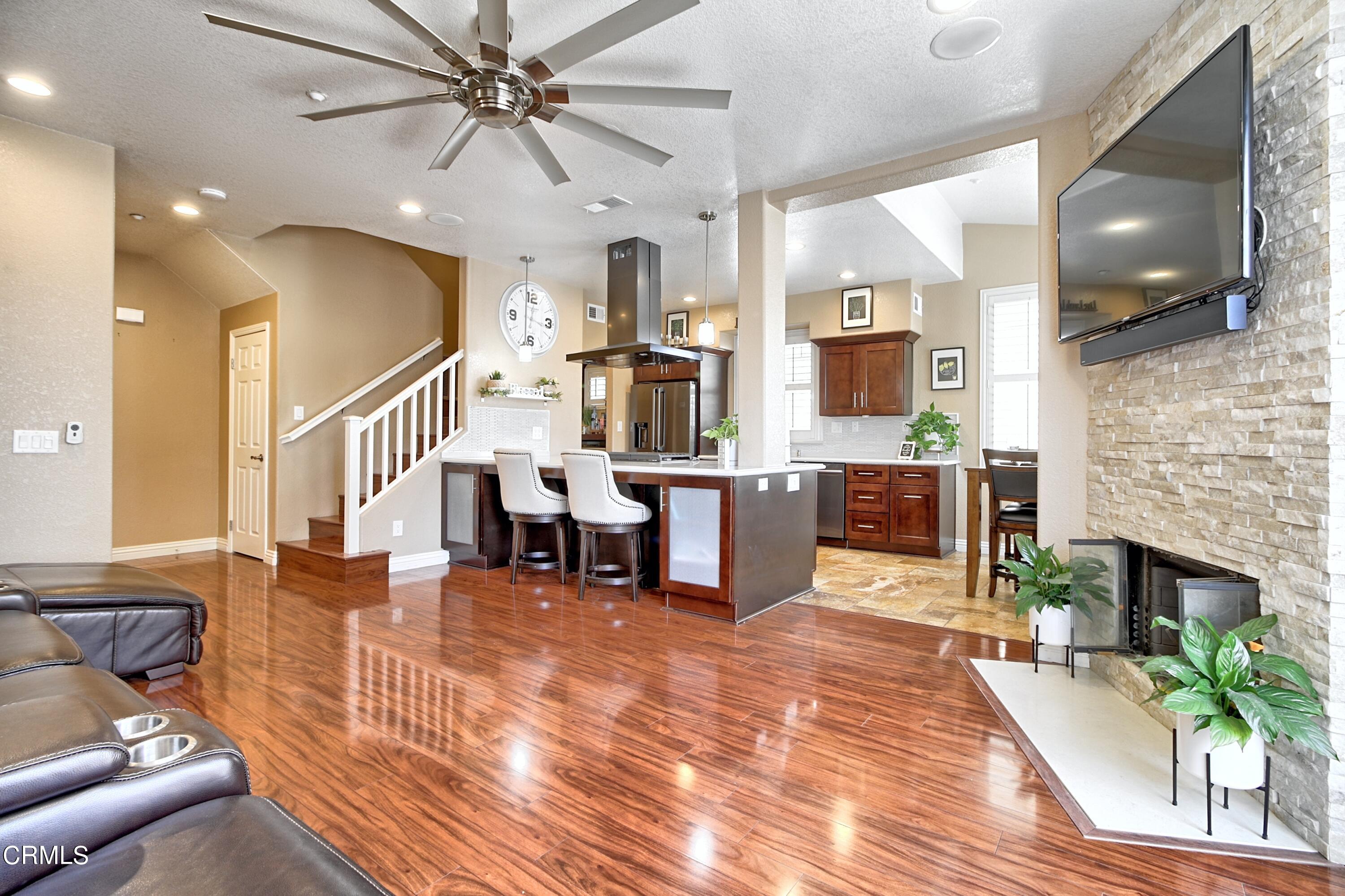 2062 Avila Place Oxnard, CA 93036 - Photo 50 of 52 a living room with fireplace furniture and a flat screen tv