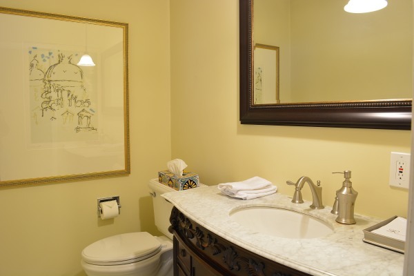 1833 Clover Road Northbrook, IL 60062 - Photo 11 of 25 a bathroom with a granite countertop sink and a mirror