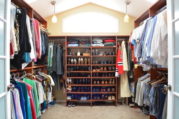 1833 Clover Road Northbrook, IL 60062 - Photo 18 of 25 a view of walk in closet with clothes and shoes