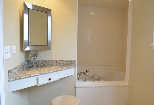 1833 Clover Road Northbrook, IL 60062 - Photo 20 of 25 a bathroom with a granite countertop sink and a mirror