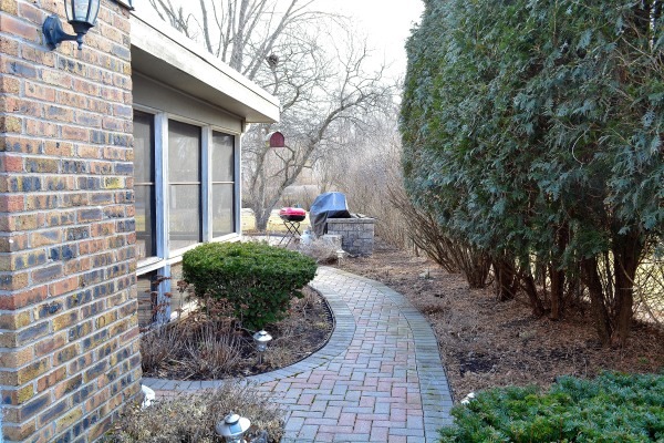 1833 Clover Road Northbrook, IL 60062 - Photo 22 of 25 a view of a house with a yard