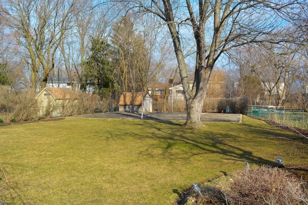 1833 Clover Road Northbrook, IL 60062 - Photo 24 of 25 a view of a yard with swimming pool