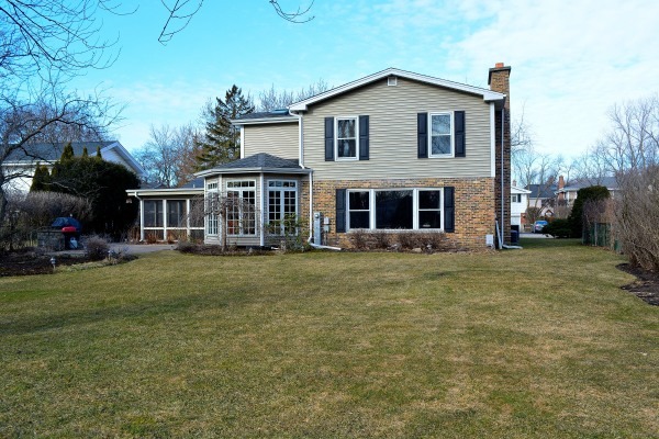 1833 Clover Road Northbrook, IL 60062 - Photo 25 of 25 a front view of a house with a garden