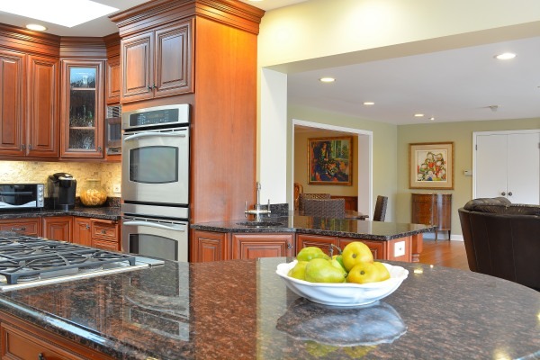 1833 Clover Road Northbrook, IL 60062 - Photo 8 of 25 a kitchen with a stove a sink and a dining table