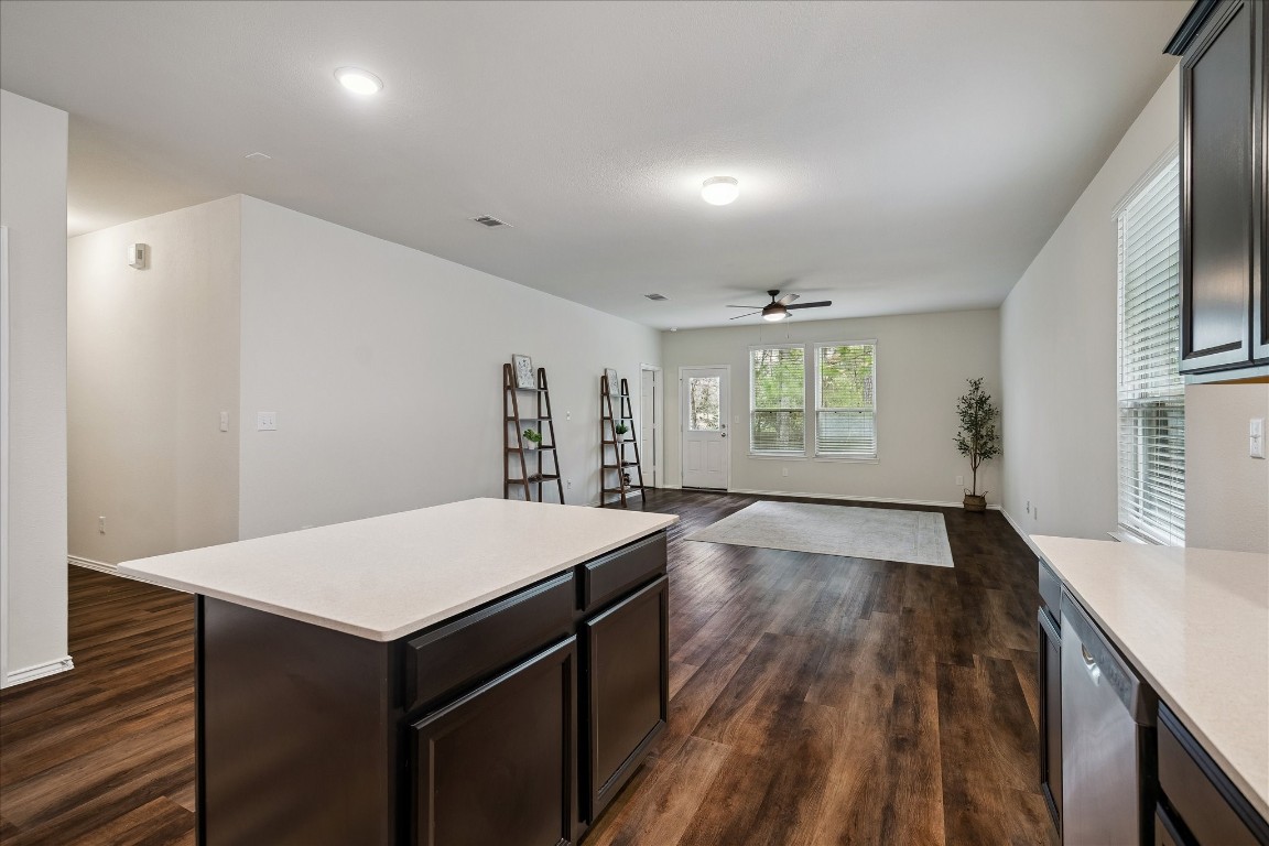 4275 Pine Still Road Conroe, TX 77304 - Photo 10 of 20 a kitchen with a wooden floor and window