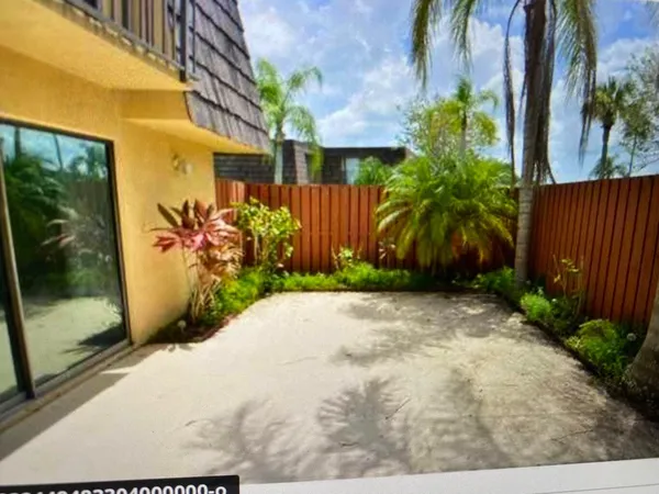 a view of a garden with a pathway