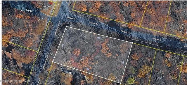 a view of a yard from a balcony