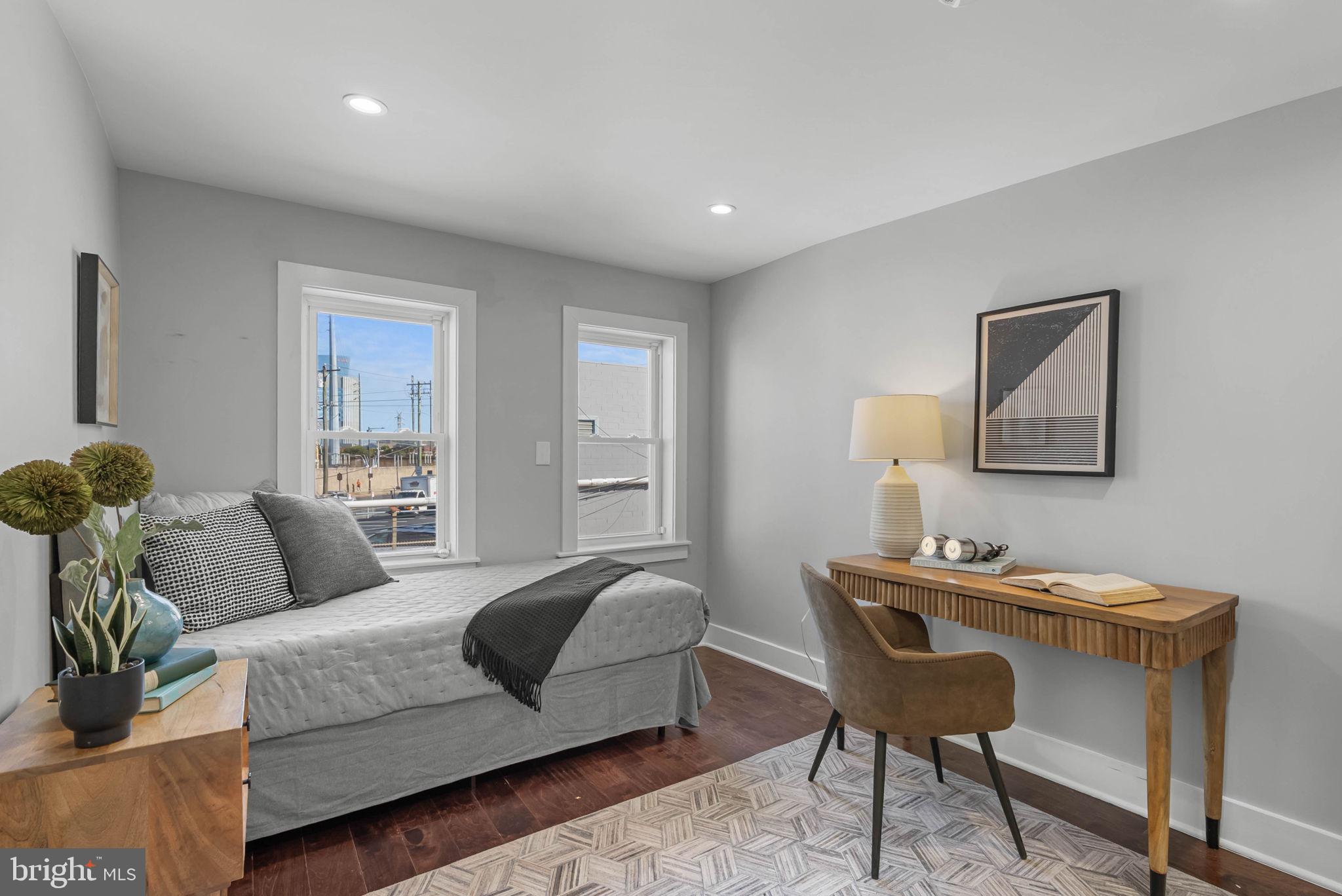 2639 Ellsworth Street Philadelphia, PA 19146 - Photo 13 of 20 a living room with furniture and a potted plant