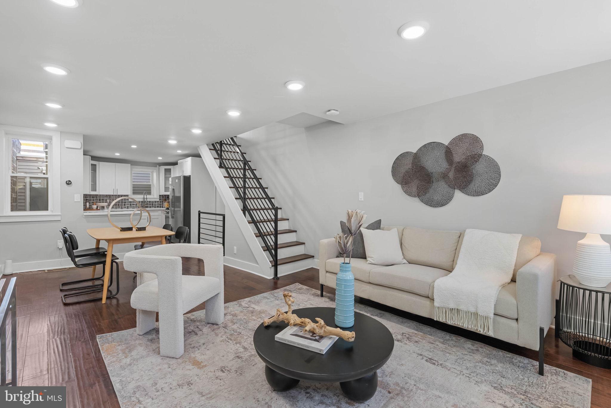 2639 Ellsworth Street Philadelphia, PA 19146 - Photo 2 of 20 a living room with furniture and a wooden floor