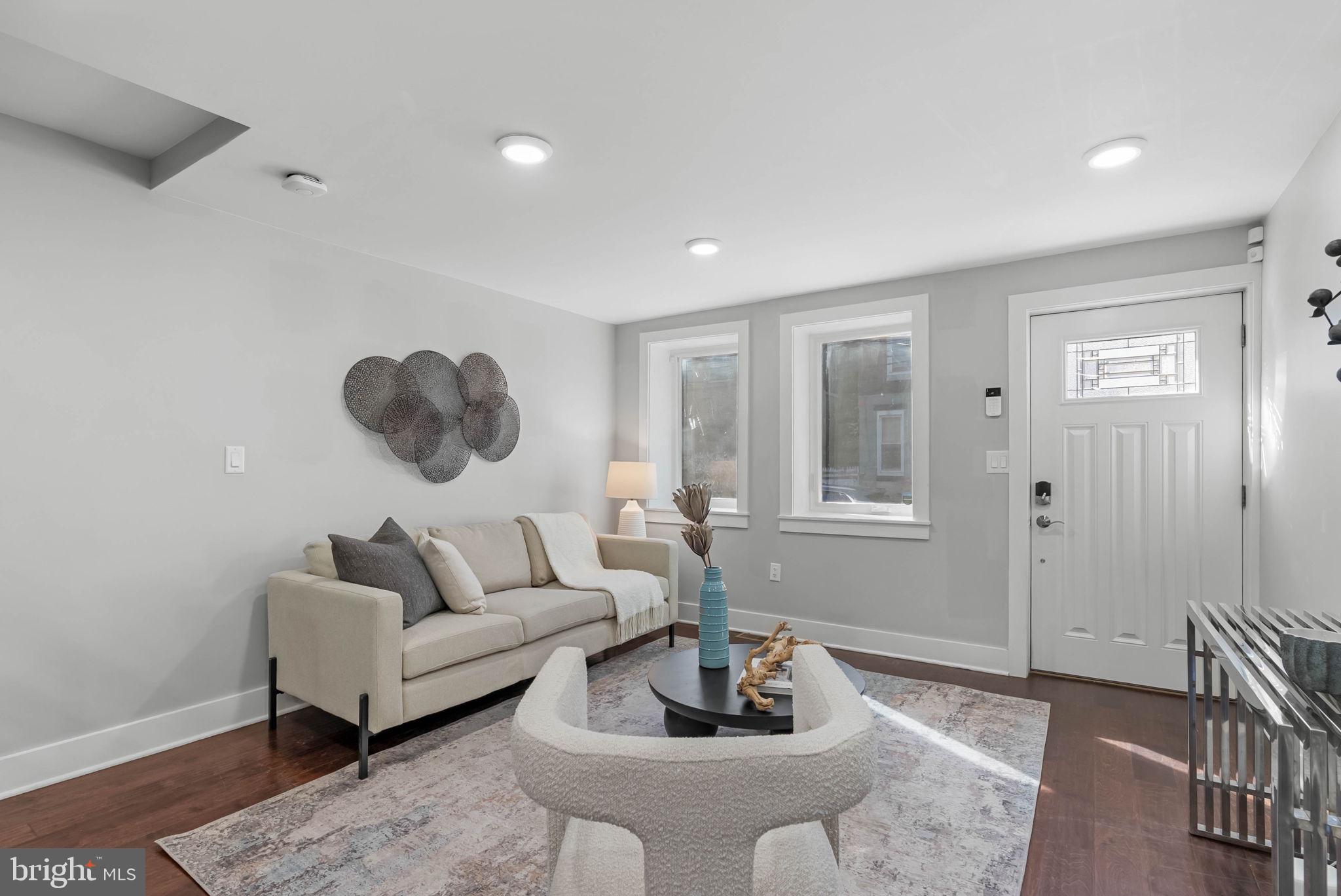 2639 Ellsworth Street Philadelphia, PA 19146 - Photo 7 of 20 a living room with furniture and a rug