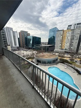 a view of a balcony with an outdoor space