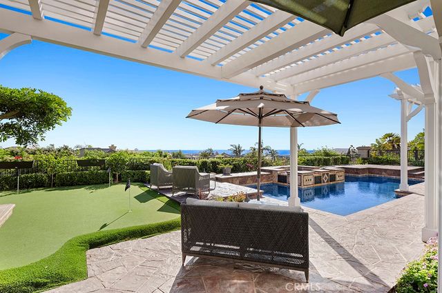 a view of a terrace with sitting area