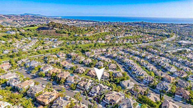 an aerial view of a city with lots of residential buildings