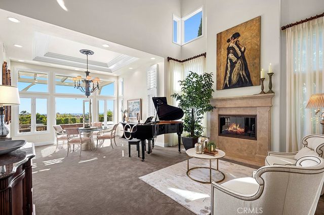 a living room with furniture a lamp and a fireplace