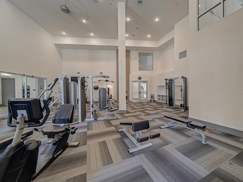 2700 Old Denton Road, Unit 3347 Carrollton, TX 75007 - Photo 21 of 30 a view of a room with gym equipment