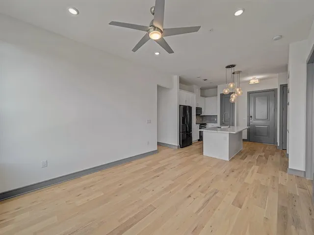 a view of a kitchen with a sink and a kitchen