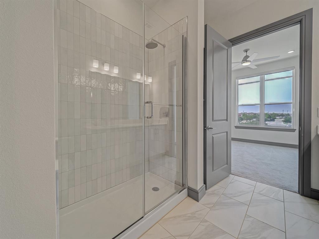 2700 Old Denton Road, Unit 3347 Carrollton, TX 75007 - Photo 10 of 30 a bathroom with a shower and a sink