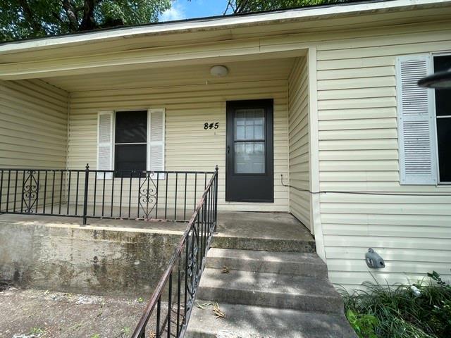 845 Rumfield Road White Settlement, TX 76108 - Photo 2 of 19 a front view of a house with a garden